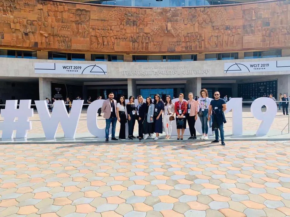 eWorld colleagues outside the World Congress on Information Technology in Yerevan
