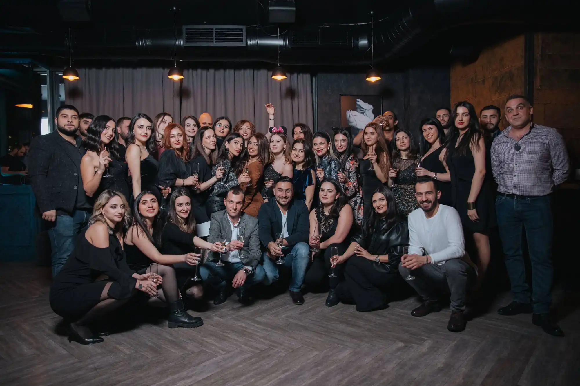 The eWorld group at a company celebration